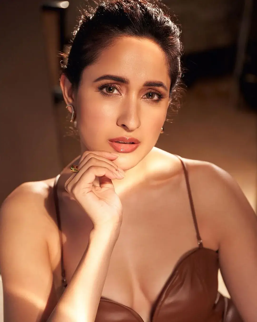 Pragya Jaiswal Stunning Looks In Long Sleeveless Maroon Gown